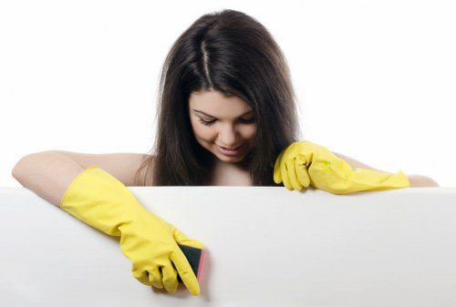 Catford cleaners handling deep cleaning tasks in a modern kitchen